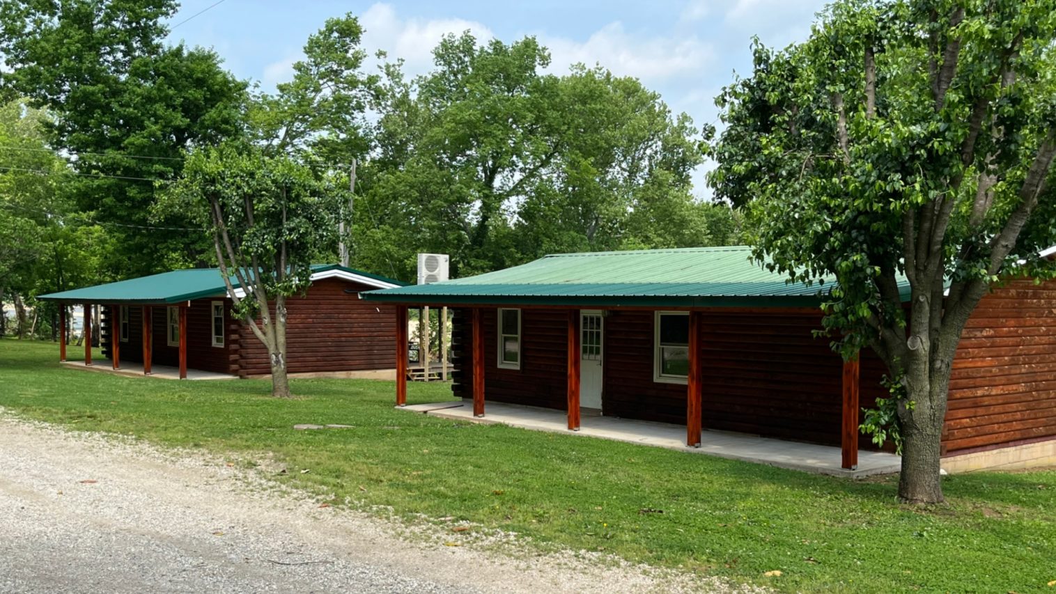 Cabin with covered porch in pineville mo